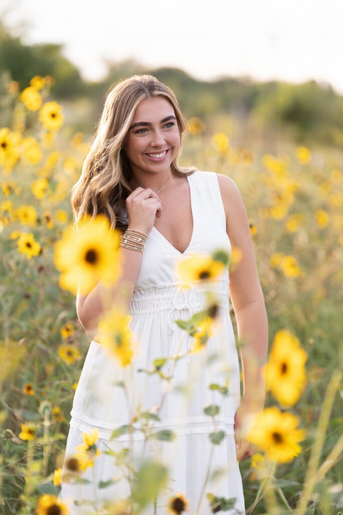 outdoor senior picture idea sunflowers in field