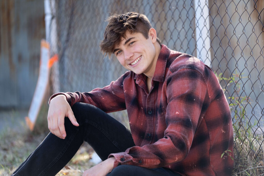 Senior guy session photo in industrial setting
